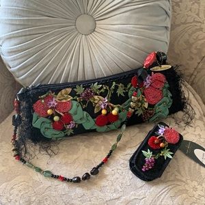 Mary Frances handbag black material accented with beaded fruit design